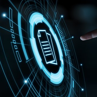 A man's hand pointing at a futuristic screen with a graphic