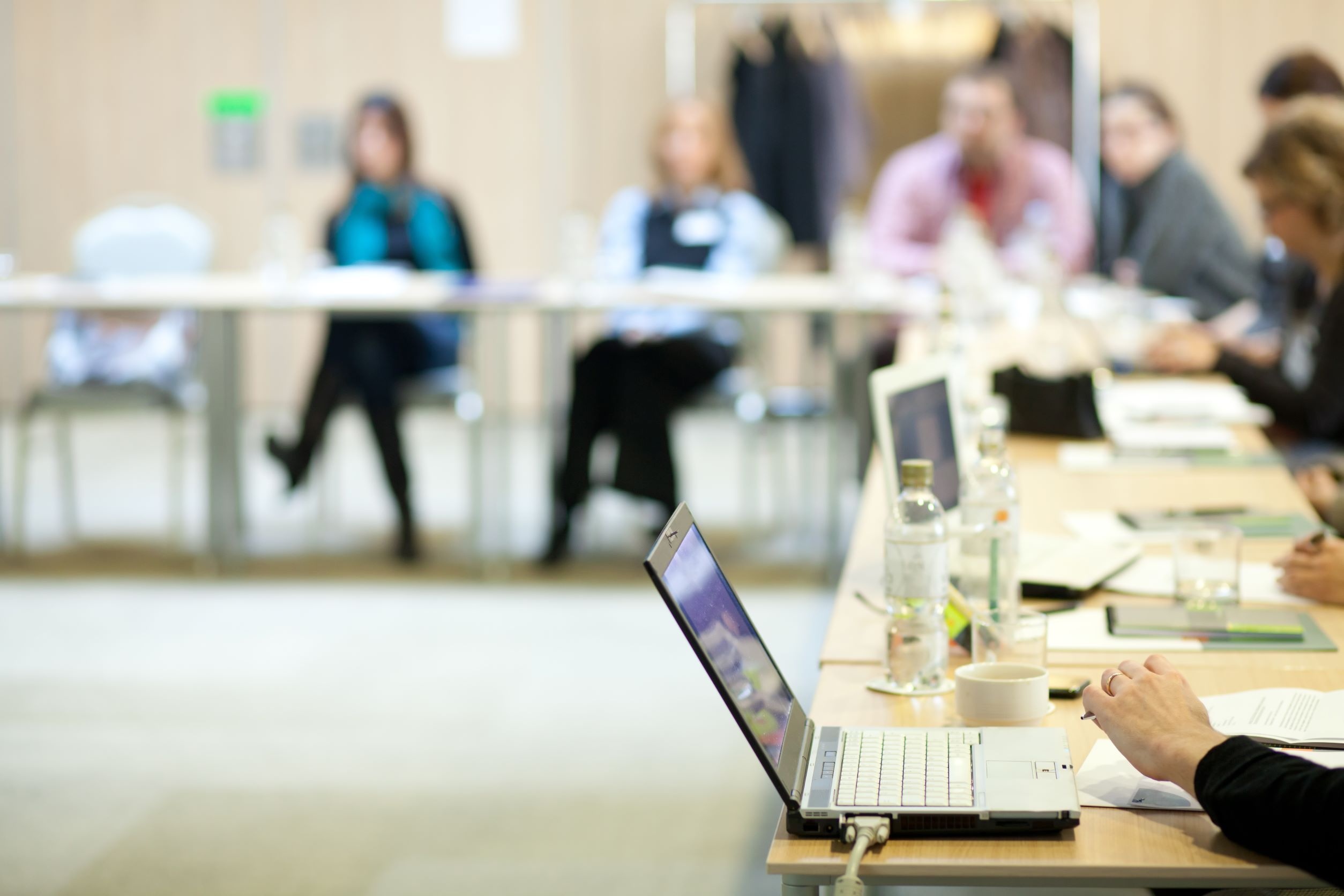 Image of students in a classroom looking at their computers